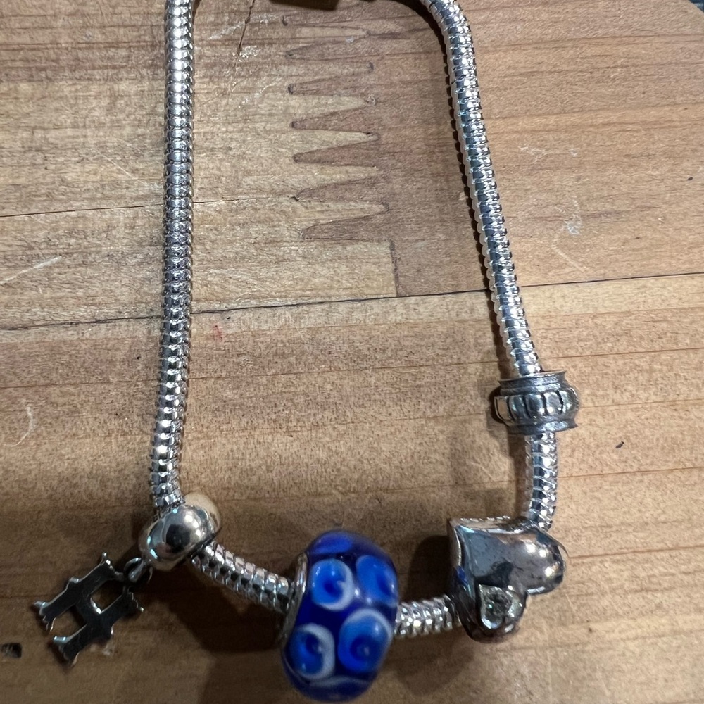 Pandora bracket with charms